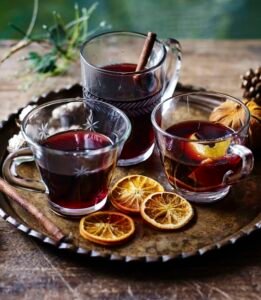Mulled Wine served in Frosted Glasses with Mince Pies and Fresh Cream